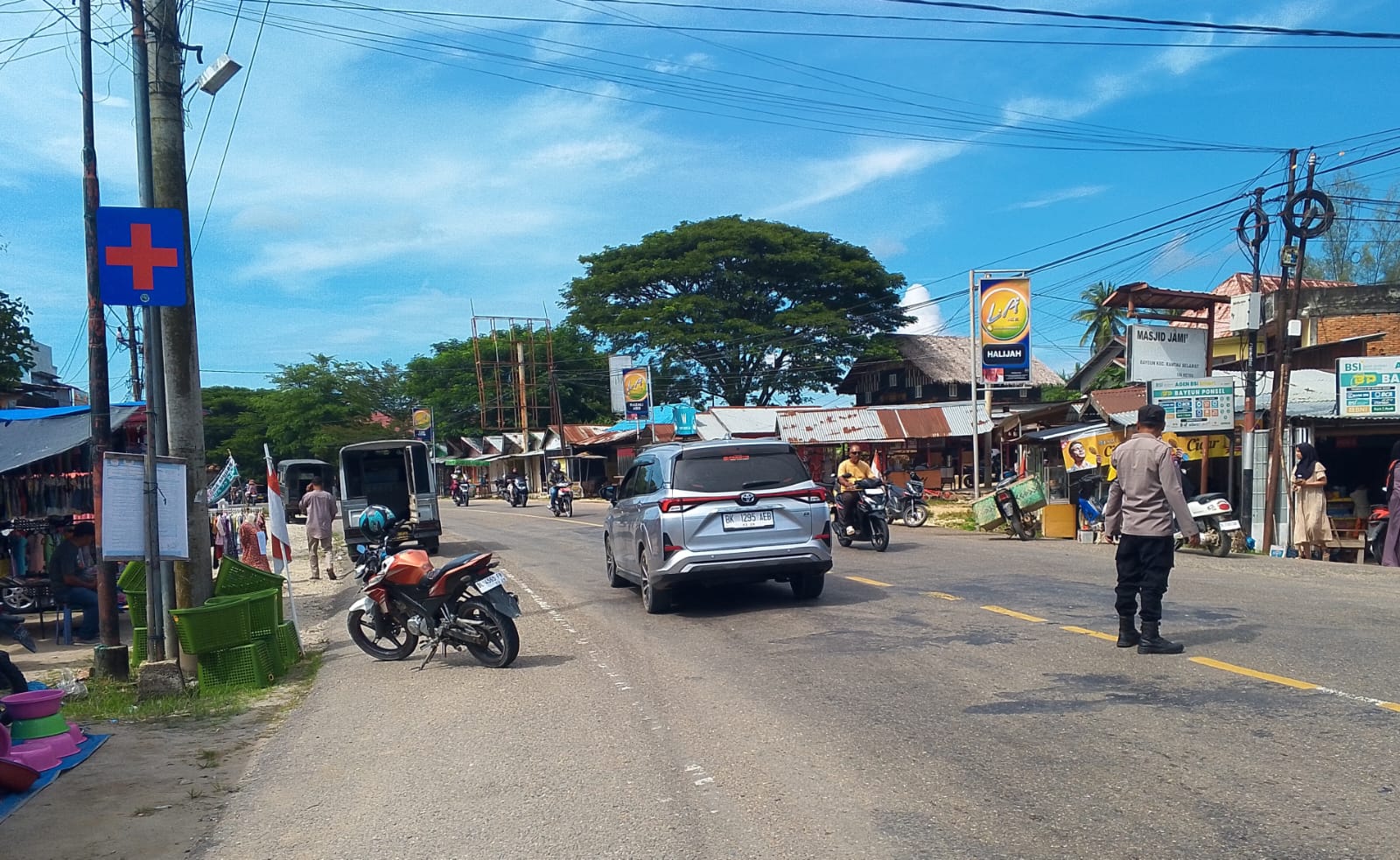 Polsek Rantau Selamat Laksanakan Strong Point Pagi di Jalan Medan–Banda Aceh