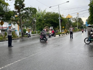 Sat Lantas Polres Langsa Laksanakan Strong Point Pagi di Jalan Ahmad Yani Kota Langsa