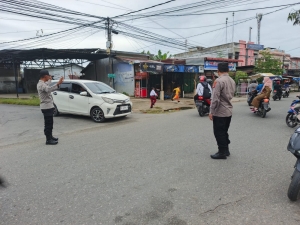 Polsek Langsa Laksanakan Gatur Lalin untuk Wujudkan Kamtibcarlantas Aman dan Tertib