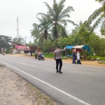 Personel Polsek Sungai Raya Atur Arus Kendaraan di Titik Padat