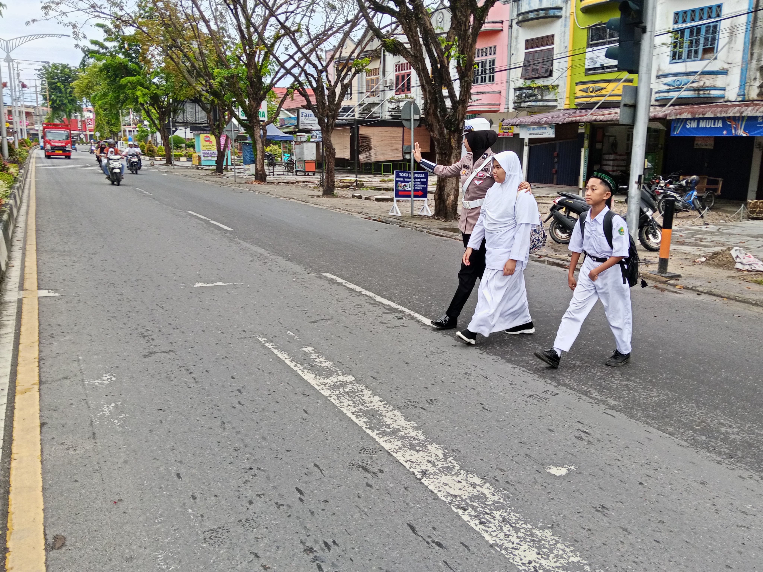Satlantas Polres Langsa Laksanakan Strong Point Pagi di Jalan Ahmad Yani