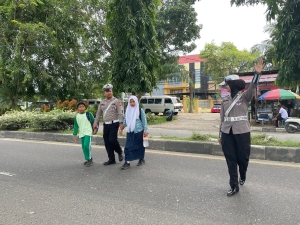 Sat Lantas Polres Langsa Laksanakan Strong Point dan Pengaturan Lalu Lintas Pagi di Jalan Ahmad Yani