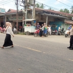 Polsek Sungai Raya Laksanakan Protap 01 di Simpang Pasar Pekan