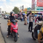 Polsek Sungai Raya Gelar Protap 01 di Simpang Pasar Pekan