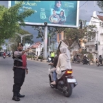 Personel Sat Samapta Polres Langsa Laksanakan Strong Point Pagi untuk Kelancaran Aktivitas Masyarakat
