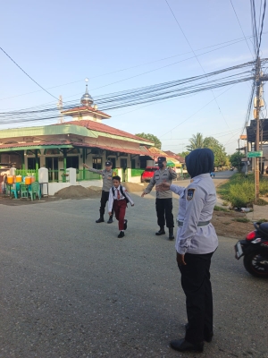Polsek Langsa Optimalkan Protap Pagi di Persimpangan Padat Aktivitas Warga