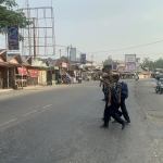 Polsek Rantau Selamat Gelar Strong Point Pagi Atur Lalu Lintas di Jalur Nasional