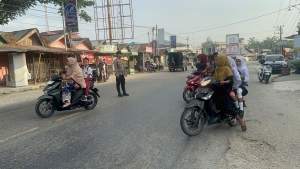 Polsek Rantau Selamat Gelar Strong Point Pagi untuk Kelancaran Arus Lalu Lintas
