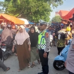 Satlantas Polres Langsa Laksanakan Pengaturan Lalu Lintas di Lokasi Penjualan Daging Meugang