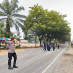 Polsek Sungai Raya Laksanakan Protap 01 untuk Mendukung Keamanan dan Kelancaran Lalu Lintas di Lingkungan Sekolah