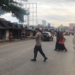 Polsek Rantau Selamat Intensifkan Strong Point Pagi Demi Kelancaran Aktivitas Masyarakat