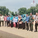 Kapolsek Birem Bayeun Hadiri Pengukuhan dan Simulasi Kampung Siaga Bencana untuk Perkuat Kesiapsiagaan Masyarakat