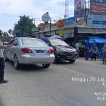 Polsek Sungai Raya Optimalkan Protap 01 Demi Kelancaran Arus Lalu Lintas di Pasar Pekan