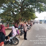 Polsek Rantau Selamat Intensifkan Strong Point Pagi Demi Kelancaran Lalu Lintas