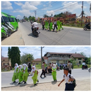 Wujud Pelayanan Polsek Manyak Payed Kepada Masyarakat Dengan Menyeberangkan Anak Sekolah