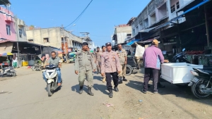 Polsek Langsa Bersama Satpol PP Sosialisasikan Penataan Pedagang Untuk Wujudkan Pasar Tertib