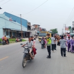 Polsek Manyak Payed Kawal Jalan Sehat HUT Ke-81 Kemerdekaan RI Di MTsN 1 Aceh Tamiang