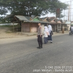 Polsek Rantau Selamat Perkuat Strong Point Pagi Jaga Kelancaran Lalu Lintas Di Bayeun